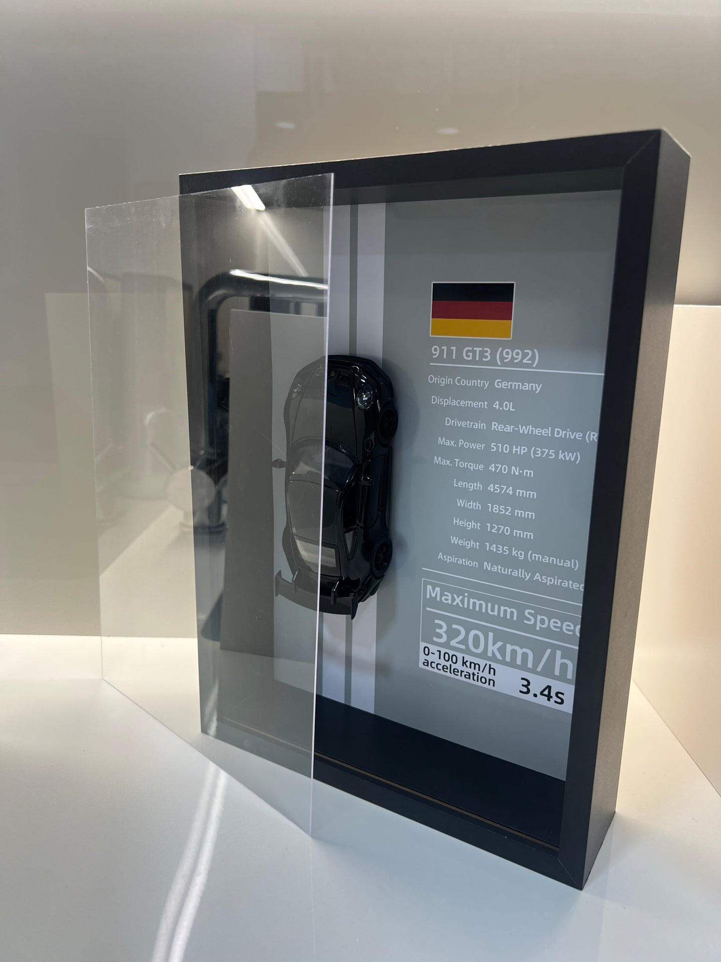 Detalles del cuadro decorativo y maqueta die-cast Porsche 911