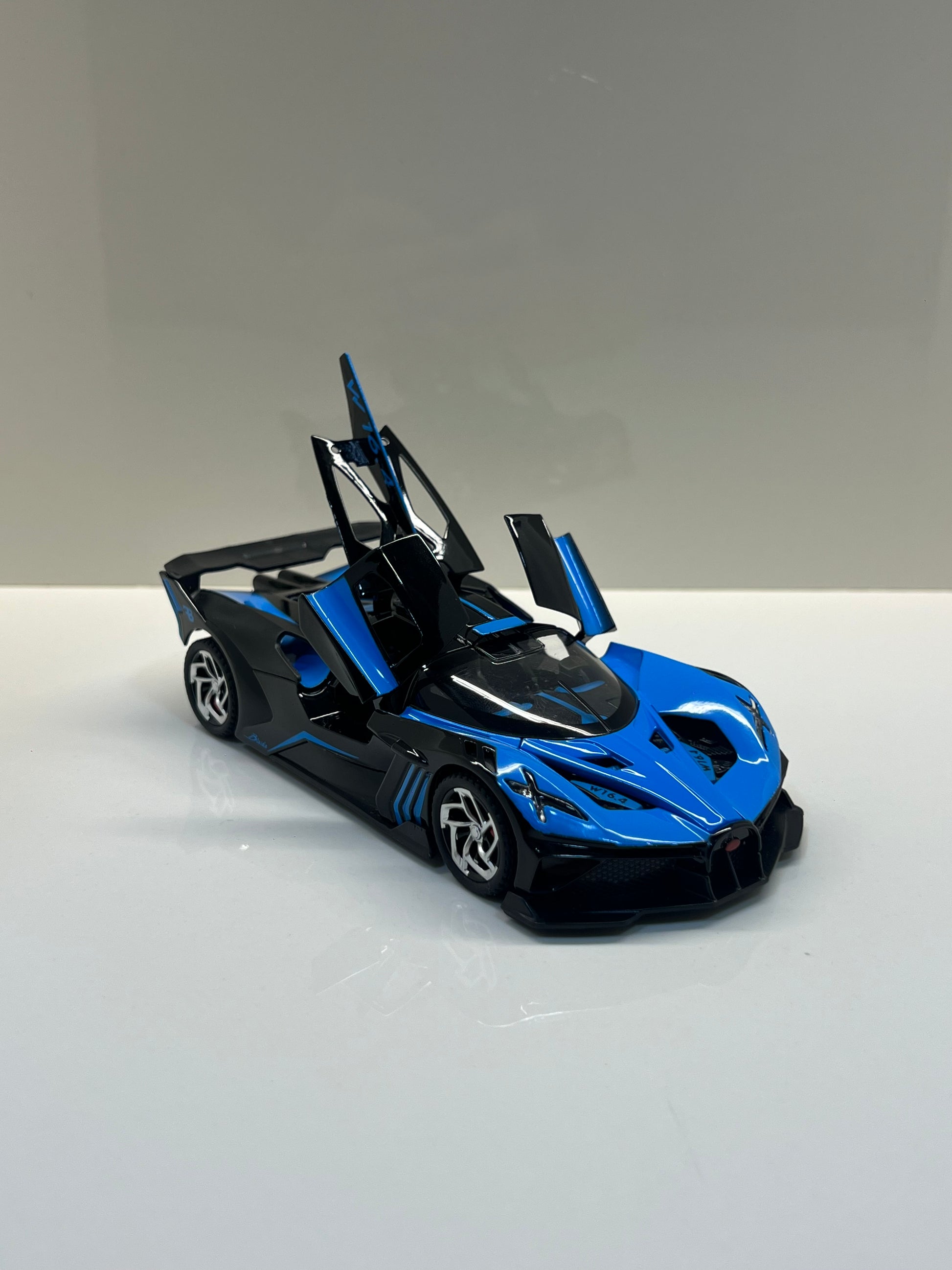 Detalles del cuadro decorativo y maqueta die-cast Bugatti Bolide