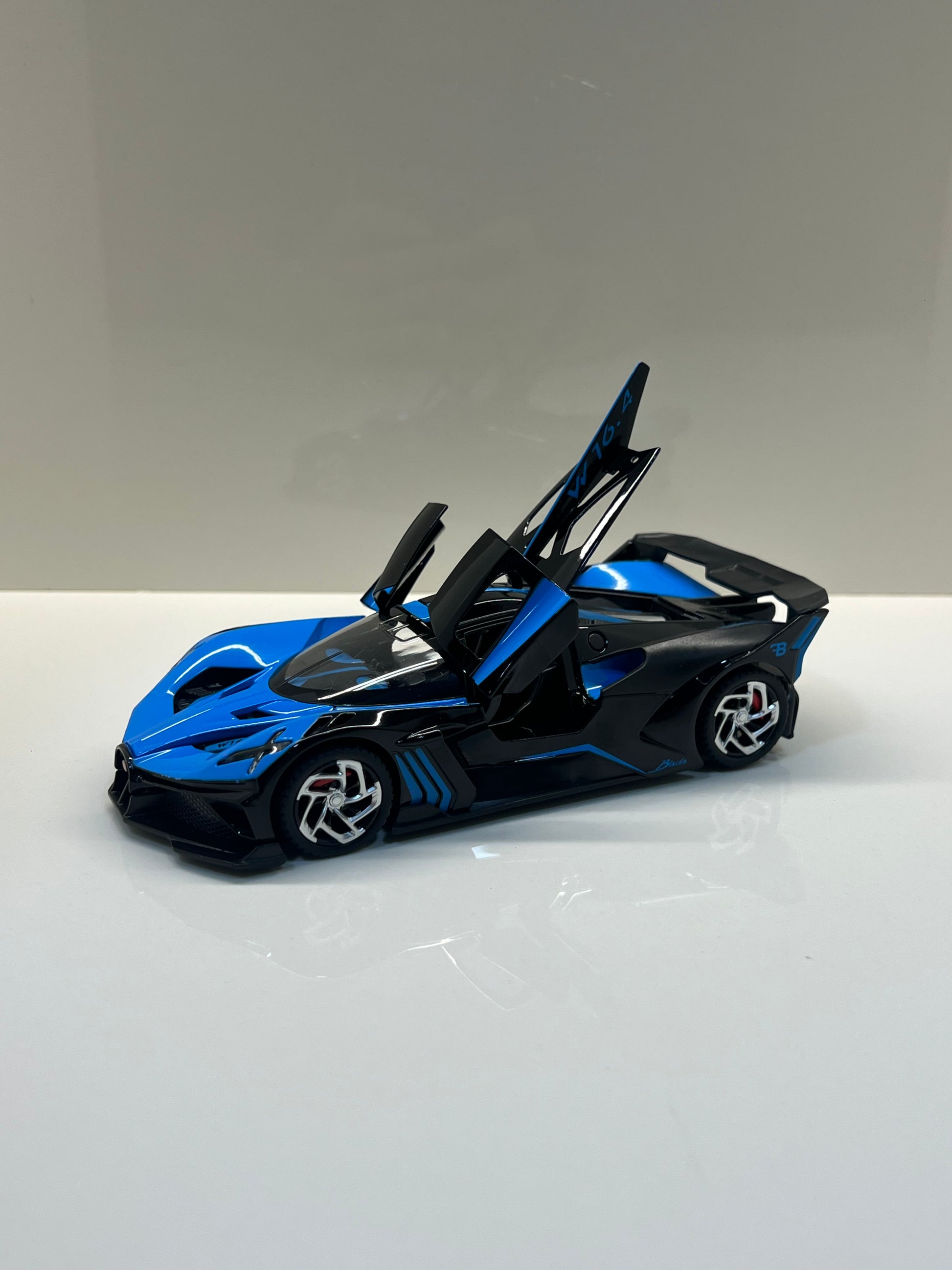 Detalles del cuadro decorativo y maqueta die-cast Bugatti Bolide